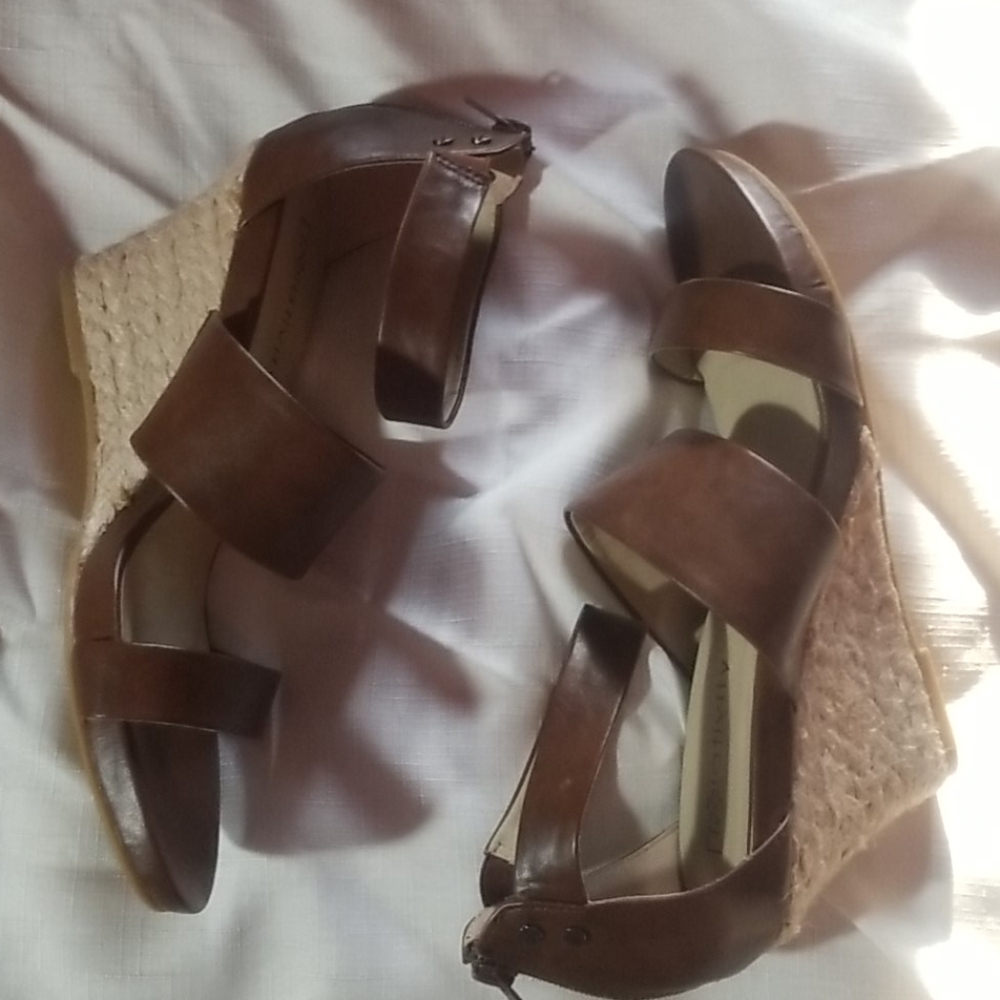 Brown new never worn leather sandle w/ wedge heel